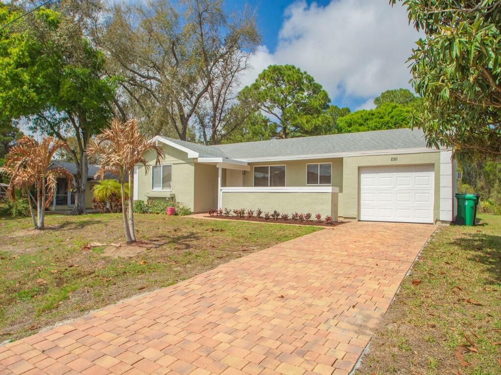 Photo of 2317 SE Gillette Avenue, Port Saint Lucie, FL 34952 (MLS # R11169857)
