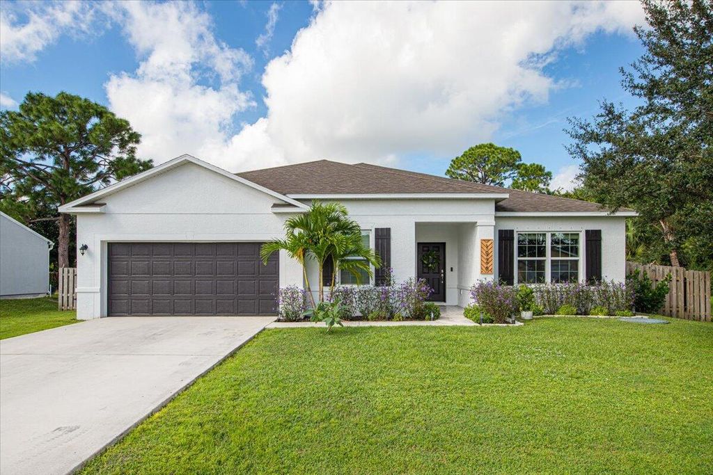 Photo of 1926 SW Flower Lane, Port Saint Lucie, FL 34953 (MLS # R11026437)