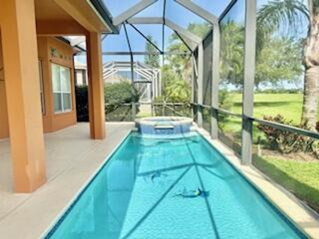 Photo of 344 NW Stratford Lane, Port Saint Lucie, FL 34983 (MLS # R11097396)