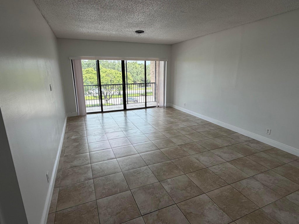 Photo of 2500 CORAL SPRINGS Drive #306, Coral Springs, FL 33065 (MLS # B26067771)