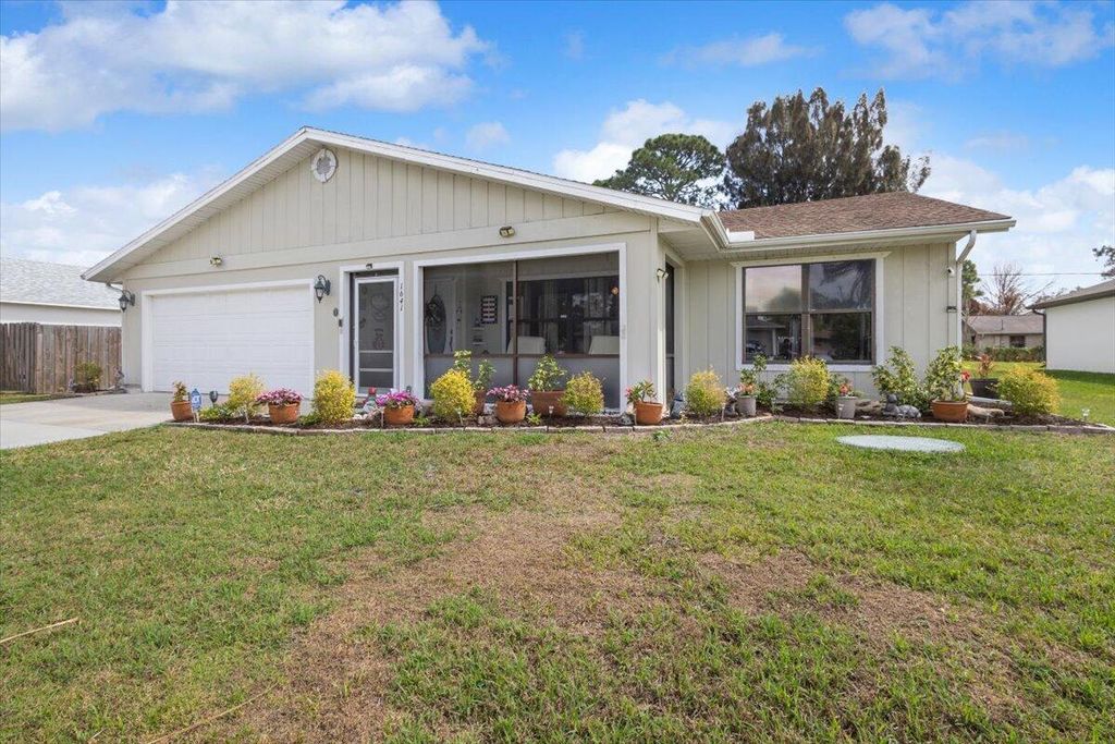 Photo of 1641 SE Clearmont Street, Port Saint Lucie, FL 34983 (MLS # R11169341)