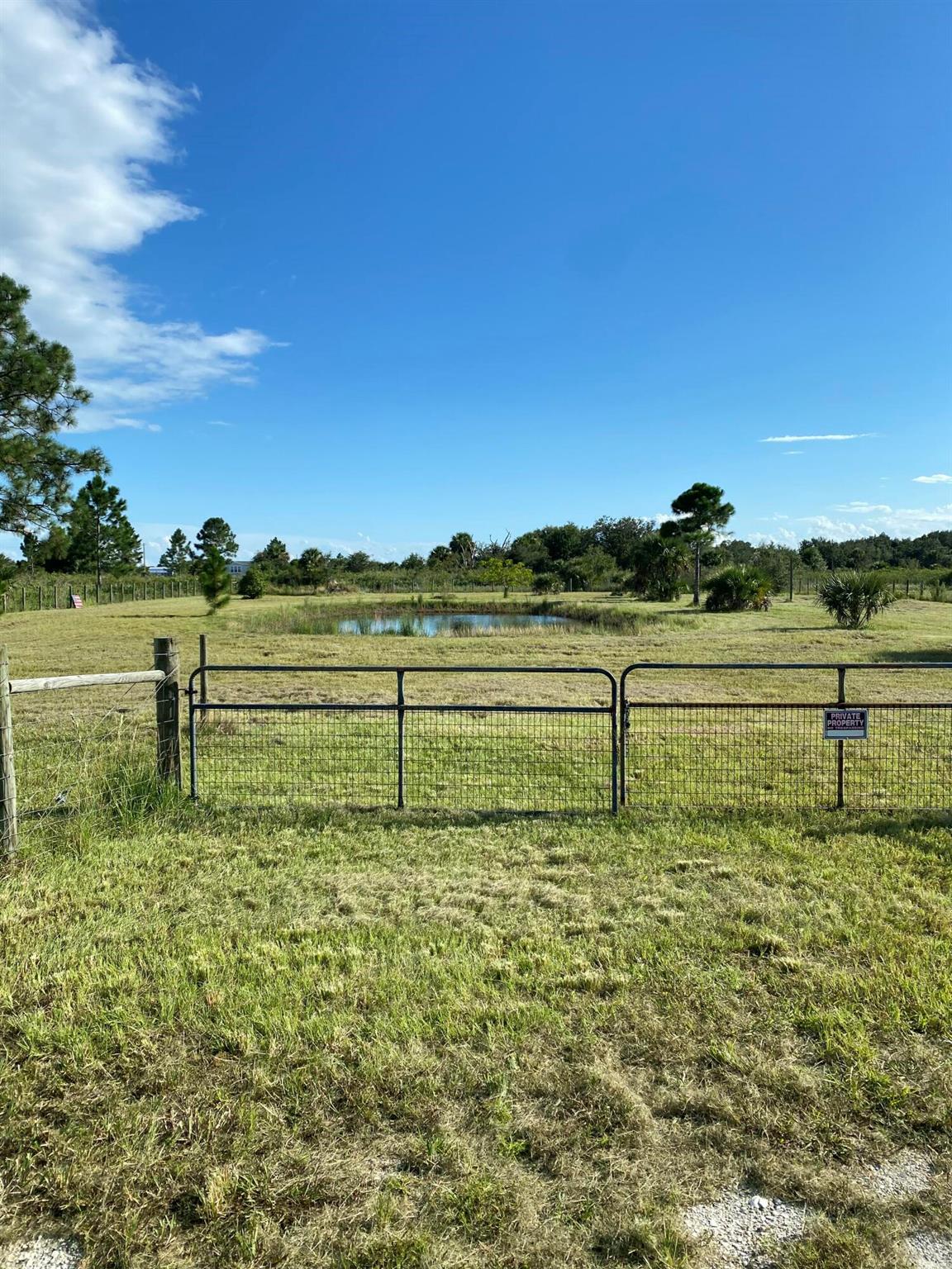 BEAUTIFUL 2 1/2 ACRES IN VIKING ESTATES. THIS PROPERTY HAS A CULVERT, PARTIALLY FENCED IN AND ALSO HAS A POND. BUILD YOUR FOREVER HOME HERE.