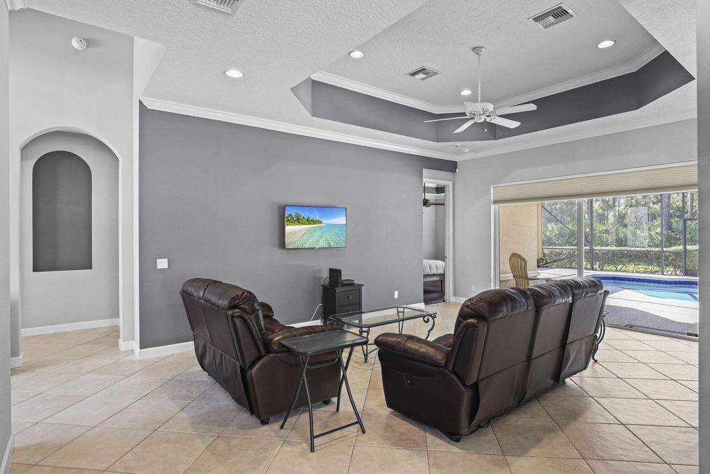 Photo of 9148 Pumpkin Ridge, St Lucie West, FL 34986 (MLS # R11137242)