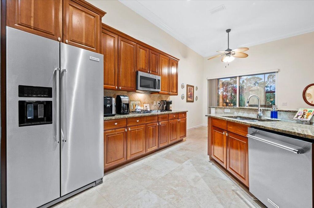 Photo of 1915 Flower Drive, Palm Beach Gardens, FL 33410 (MLS # R10944059)