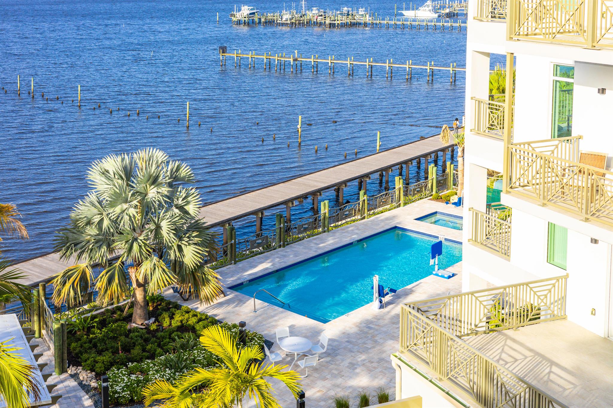 Enjoy top-floor living with stunning direct river views in this brand-new 1 bed + den, 2 bath condo at Sailfish Cove in Stuart, FL. This spectacular unit features an open-concept kitchen layout, private balcony, high ceilings, and upscale finishes. Located in an exclusive riverfront community offering resort-style amenities: heated pool, Jacuzzi, outdoor kitchen, rooftop viewing deck, and two elevators. Pet-friendly and includes one reserved parking space. Live the ultimate Florida lifestyle in the heart of Stuart, walkable to shopping, dining, and the waterfront. Call today for your private showing or a virtual tour!