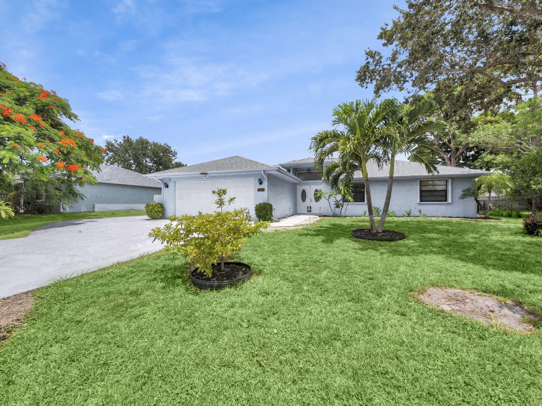 This well maintained single family home offers just under 1800 Sq Ft of comfortable living space ideal for relaxing and entertaining. Enjoy Florida living year round with a large screened patio overlooking a fully fenced backyard with mature fruit trees. Situated East of US1, this property is just 15 minutes from the beach conveniently close to downtown Jensen Beach, shopping, dining, and more. Don't miss this opportunity to own this home. Schedule your showing today!