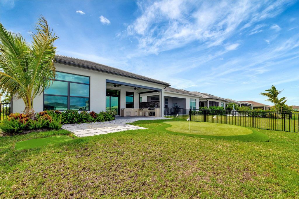 Photo of 9446 SW Pepoli Way, Port Saint Lucie, FL 34987 (MLS # R11081296)