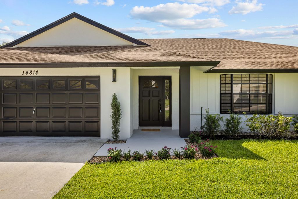 Photo of 14814 Paddock Drive, Wellington, FL 33414 (MLS # B26049748)