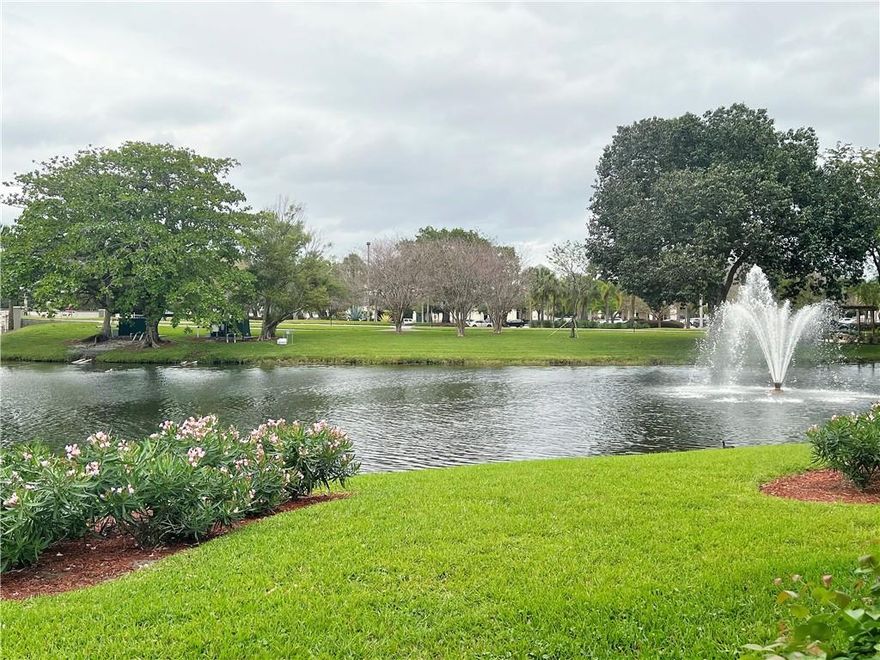 TURN-KEY FURNISHED GROUND FLOOR with LAKE/FOUNTAIN VIEW and a Private Back Yard just outside the PLEXI-GLASS ENCLOSED PATIO with TILE ON THE DIAGONAL Except Bedrooms. Short Walk to Clubhouse, Tennis, Pickleball and Village Pool. ASSOCIATION REQUIRES ONE OCCUPANT 55+ AND 20% DOWN PLUS $250 REFUNDABLE MOVE-IN FEE. Information Deemed Reliable but, Not Guaranteed. EXCLUDES TOOLS AND PERSONAL THINGS.