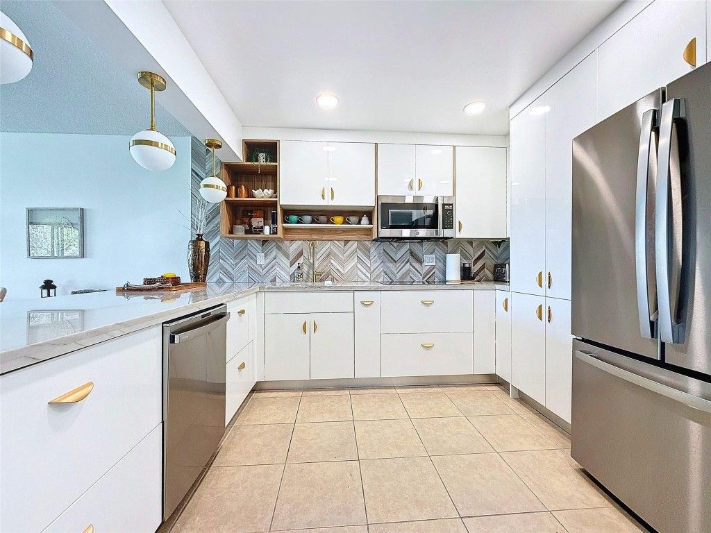 Photo of 2311 S Cypress Bend Drive #319, Pompano Beach, FL 33069 (MLS # F10487647)