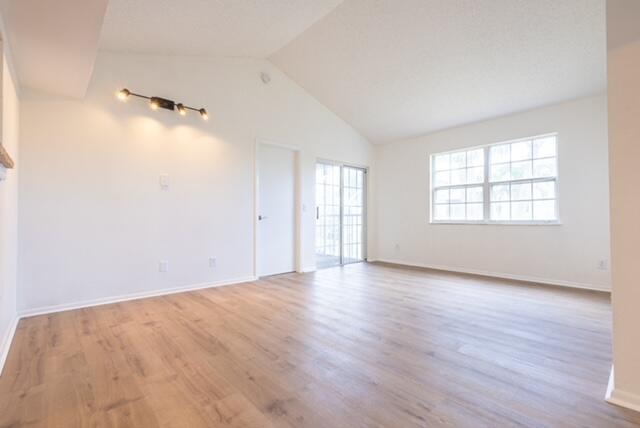 Welcome to this charming move in ready condo with so much natural light! Recently updated, this home features new paint, wood look - flooring, cabinets, vanities, washer/dryer, and stainless steal appliances. Enjoy the benefits of a brand-new roof and fresh exterior paint, ensuring low maintenance and long-term durability. Take a dip in the larger of two pools, just steps away from your unit or the calming pond with fountain in your back yard. Whether you're a first-time buyer, or down-sizer, this well-maintained property is a smart choice.Conveniently located near shops, dining, and commuter routes! HOA fees include lawn care, water, roof maintenance, and trash removal.This community is on the same power grid as the hospital so you'll never lose power in a storm!