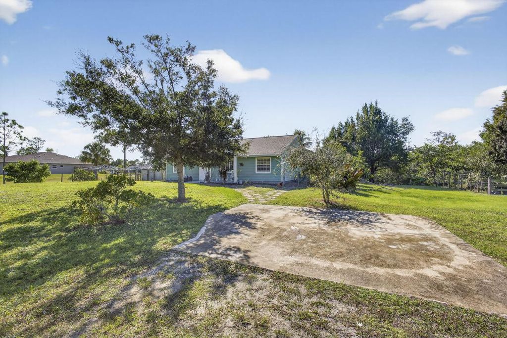 Photo of 18384 Murcott Boulevard, The Acreage, FL 33470 (MLS # R11135061)