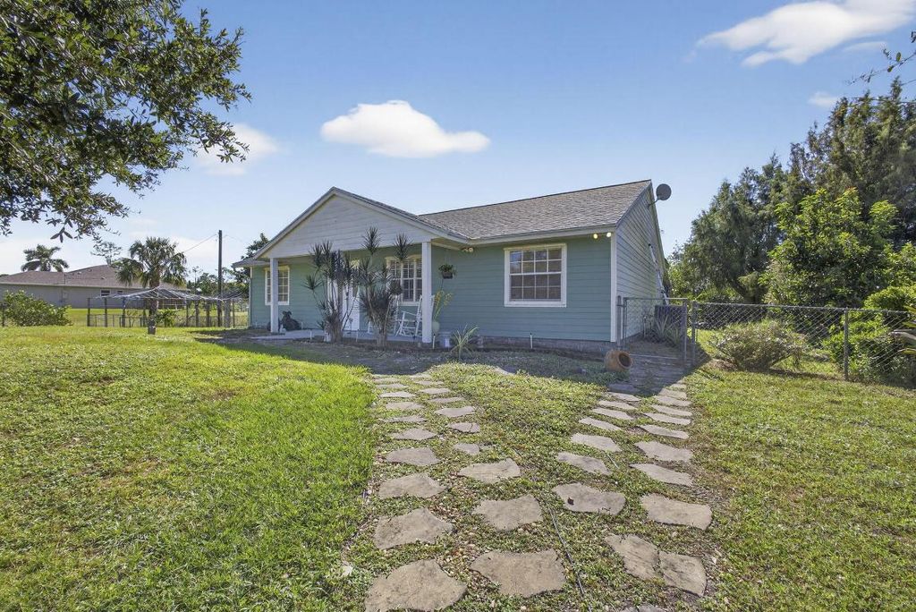 Photo of 18384 Murcott Boulevard, The Acreage, FL 33470 (MLS # R11135061)