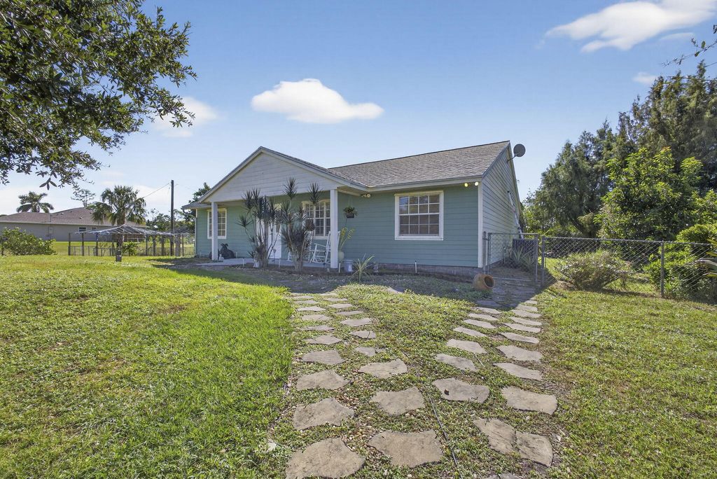 Photo of 18384 Murcott Boulevard, The Acreage, FL 33470 (MLS # R11135061)