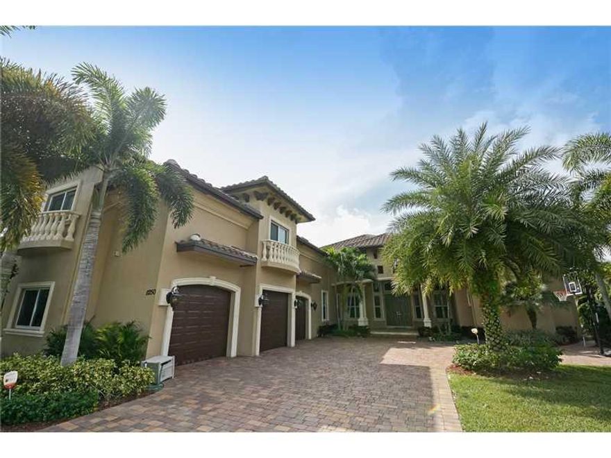 The Best of the Best Resort Style with total Elegance & Top of the line luxuries everywhere. Gated Estate. Modern Architecture. Marble & Wood Floors. Breathtaking kitchen with full walk in pantry. All Bathrooms are finely appointed. Master has beverage ce nter. Monster Bonus Room upstairs with Full bath. Closets built out.Wine Room. Outdoor Summer Kitchen.  High end window treatments. Custom Hot Tub built for 10+. Extended Travertine patio deck with tons of entertaining areas. Fully Fenced.Impact Windows.