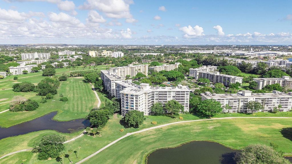 Photo of 2681 S Course Drive #207, Pompano Beach, FL 33069 (MLS # R11156455)