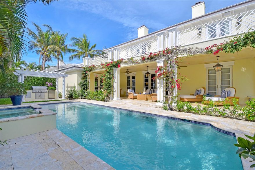 LOCATION! LOCATION! LOCATION! Just four in from the ocean. This stunning like new home is perfect for both privacy and entertaining.  Impeccably maintained and hardly lived in. High ceilings, sunlight filled rooms, impact glass, gorgeous kitchen with high-end appliances, and plenty of cabinets. Spacious master bedroom with his and her bathrooms, custom walk-in closets, and oversized sun terrace. Picturesque covered loggia, outdoor kitchen, and pool with sunny southern exposure. Beautifully landscaped and surrounded by tall lush greenery and hedges. Located 3 blocks North of the Palm Beach Country Club. Deeded Beach Access.