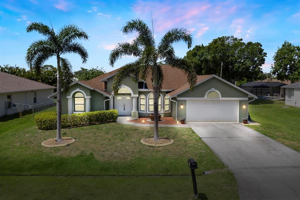 Photo of 2110 SE Gaslight Street, Port Saint Lucie, FL 34952 (MLS # R10711906)