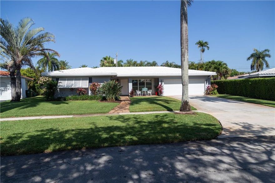 Charming Florida home in a manicured, tree-lined neighborhood boasts a luxurious lap pool with outdoor shower, a screened porch, a new indoor full bath just off the pool, and even its own in-ground generator! Completely renovated with gorgeous touches, the home has a 3-bed, 3-bath floorplan in a single-story design. No steps! Impact windows and impact-rated garage door. The front-door entry into the living area flows seamlessly into the dining room, and right into a newly-created Florida room for a spacious, open feel.  The kitchen "wows" with an island sink and dishwasher, designer backsplash, granite countertops, stainless appliance package and polished tile flooring.  Location! 10 minutes to beach and all major highways. Pine Crest and Westminster Academy schools just blocks away!