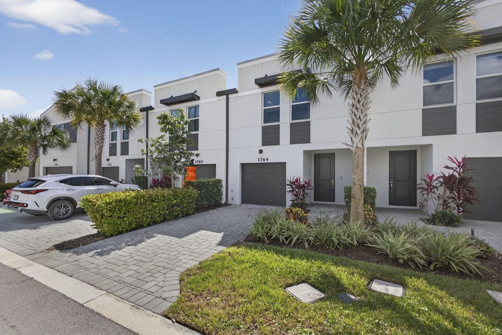 Photo of 1764 Lindley Street, Mangonia Park, FL 33407 (MLS # R11132828)