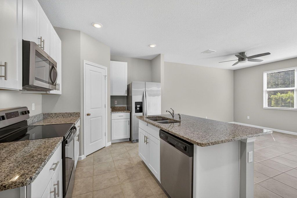 Photo of 1764 Lindley Street, Mangonia Park, FL 33407 (MLS # R11132828)