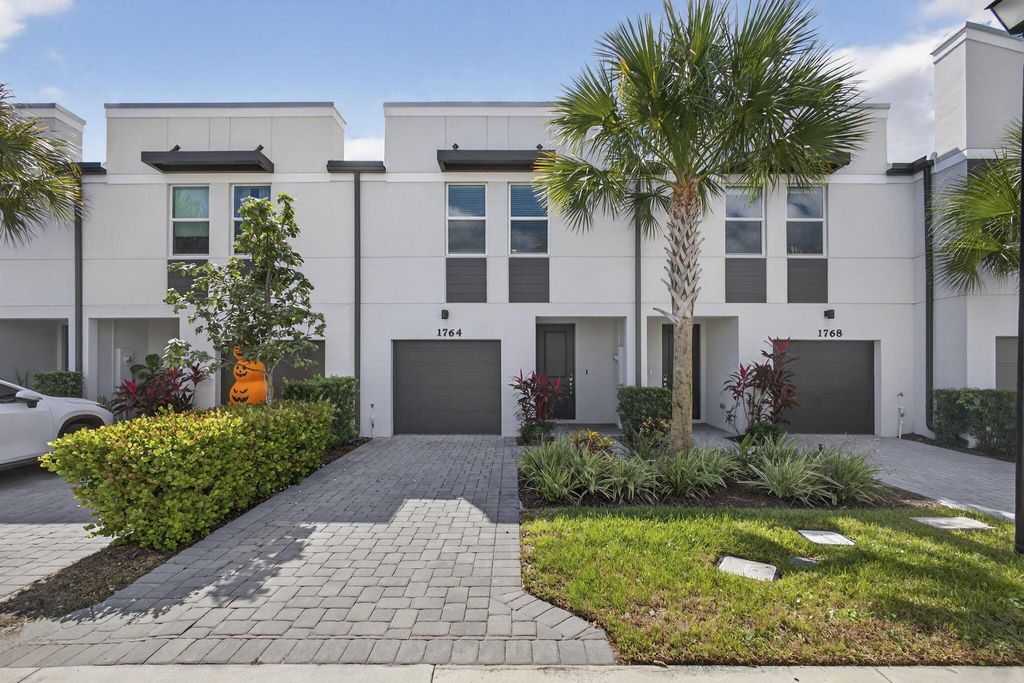 Photo of 1764 Lindley Street, Mangonia Park, FL 33407 (MLS # R11132828)