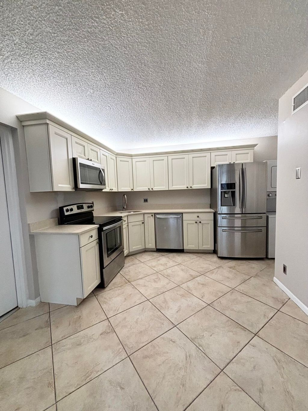 Photo of 203 Foxtail Drive #F1, Greenacres, FL 33415 (MLS # B26045143)