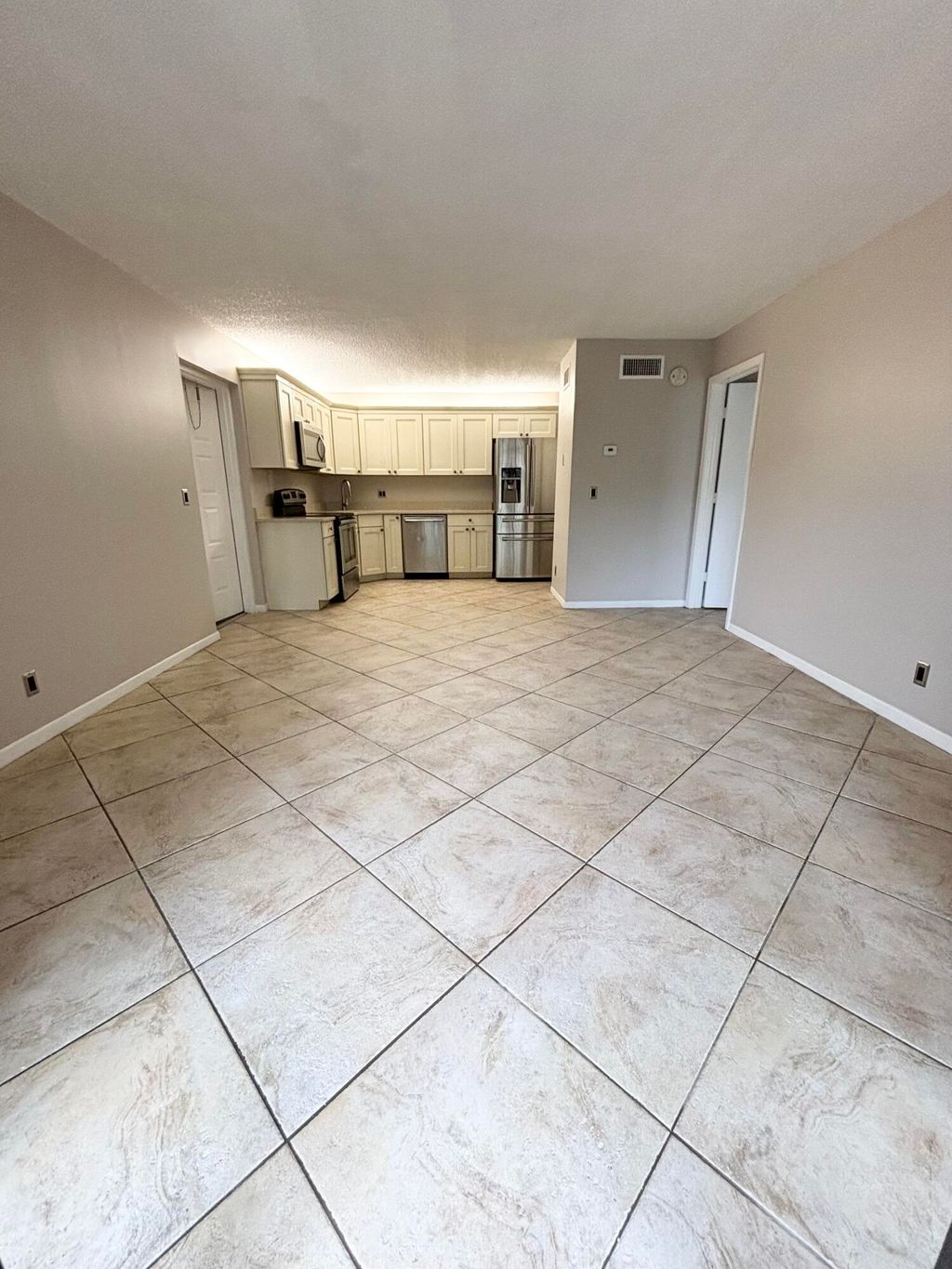 Photo of 203 Foxtail Drive #F1, Greenacres, FL 33415 (MLS # B26045143)