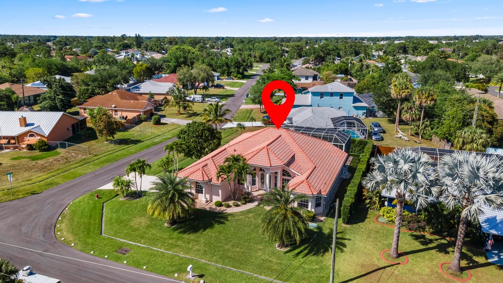 Photo of 1319 SW Sultan Drive, Port Saint Lucie, FL 34953 (MLS # R10973316)
