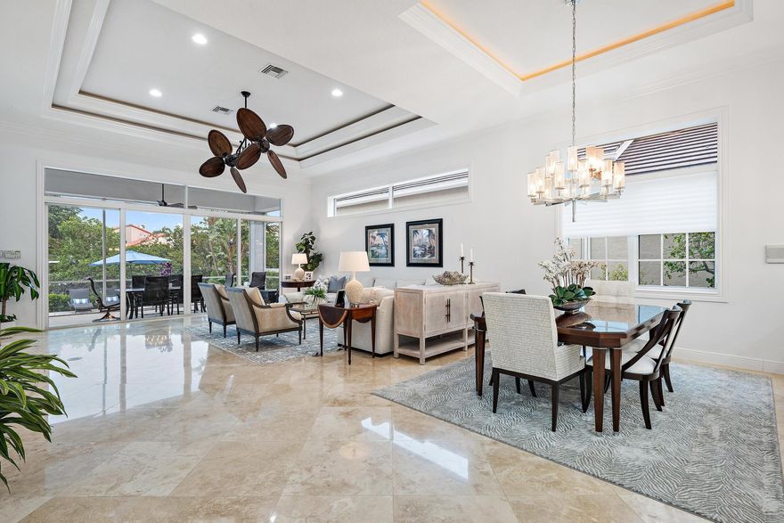 Discover the allure of waterfront living in Jonathan's Landing, where this exquisite custom home awaits, just minutes from the Inlet. The property boasts an impressive fifty feet of water frontage, enhanced by a robust 24,000-pound boat lift, an indulgent spa, an expansive pool, meticulously groomed landscapes, & a generously sized lanai, all oriented to capture the morning light from the east. The master suite is a realm of luxury unto itself, featuring high ceilings, wet bar, dual expansive walk-in closets, & an exclusive walk-in shoe sanctuary. Fine details are present throughout, such as chic diagonal marble flooring, custom crown molding, elegantly lit coffered ceilings, a convenient breakfast kitchen on the second floor with 3 bedrooms with en-suite baths.