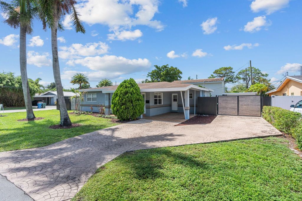 Photo of 1498 NE 39th Street, Oakland Park, FL 33334 (MLS # F10516546)