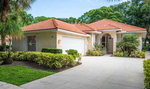 Photo of 191 E Tall Oaks Circle, Palm Beach Gardens, FL 33410 (MLS # B26045207)