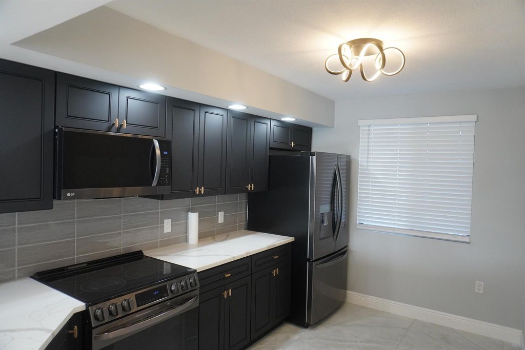 Photo of 2811 Village Boulevard #201, West Palm Beach, FL 33409 (MLS # R11041168)