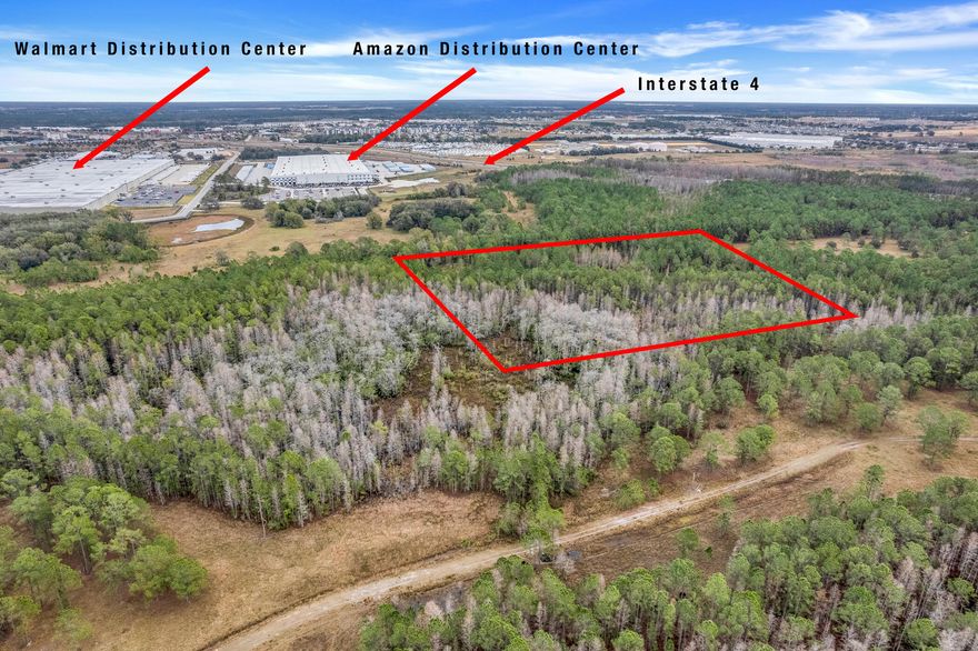 'Prime Investment Opportunity!' This 10+ acre parcel of raw land in the thriving Davenport, Florida area is a rare gem for investors. Situated near Walmart and Amazon distribution centers and offering easy access to Interstate 4, this property is perfectly positioned for future growth and development. Whether you're looking to develop, land bank, or invest in a high-demand, up-and-coming location, this lot offers unparalleled potential. Seize this unique chance to secure acreage in one of Florida's fastest-growing markets!  No public road access. zones as Core X Conservation area. Land Lock Parcel