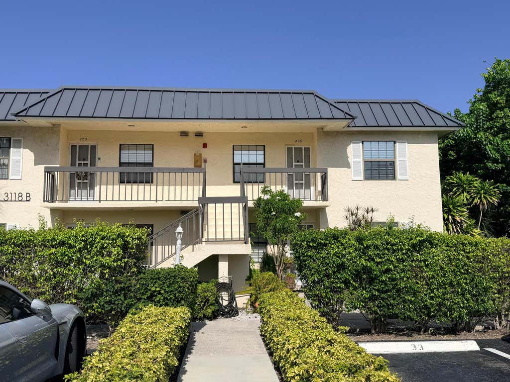 Photo of 3118 FLORIDA BLVD #206-B, Delray Beach, FL 33483 (MLS # B26068537)