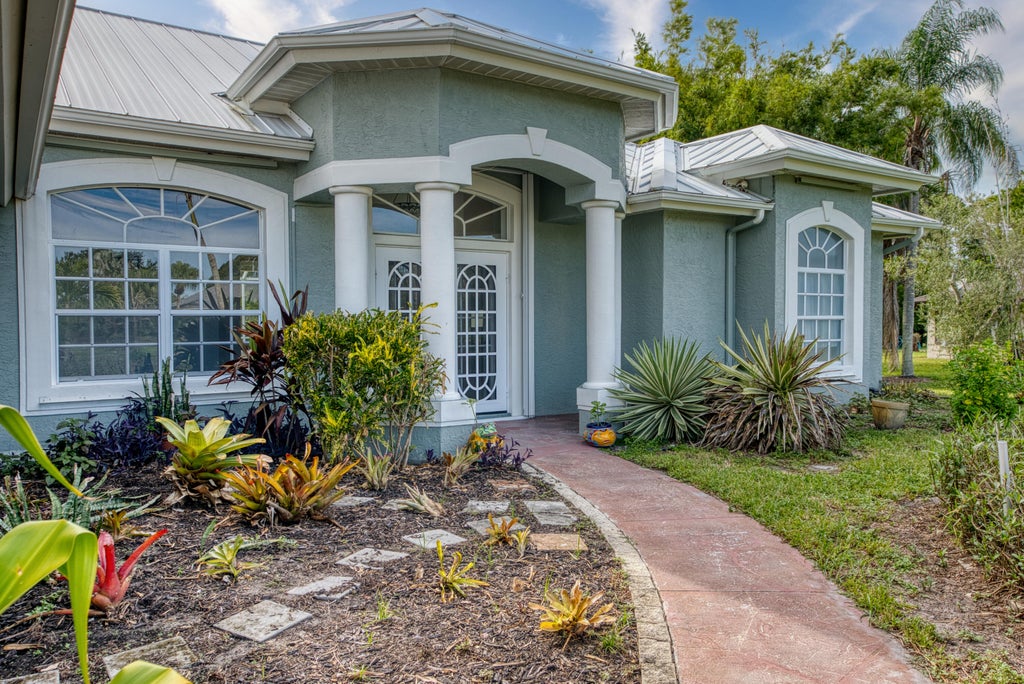 Photo of 2142 SE Morningside Boulevard, Port Saint Lucie, FL 34952 (MLS # B26065870)