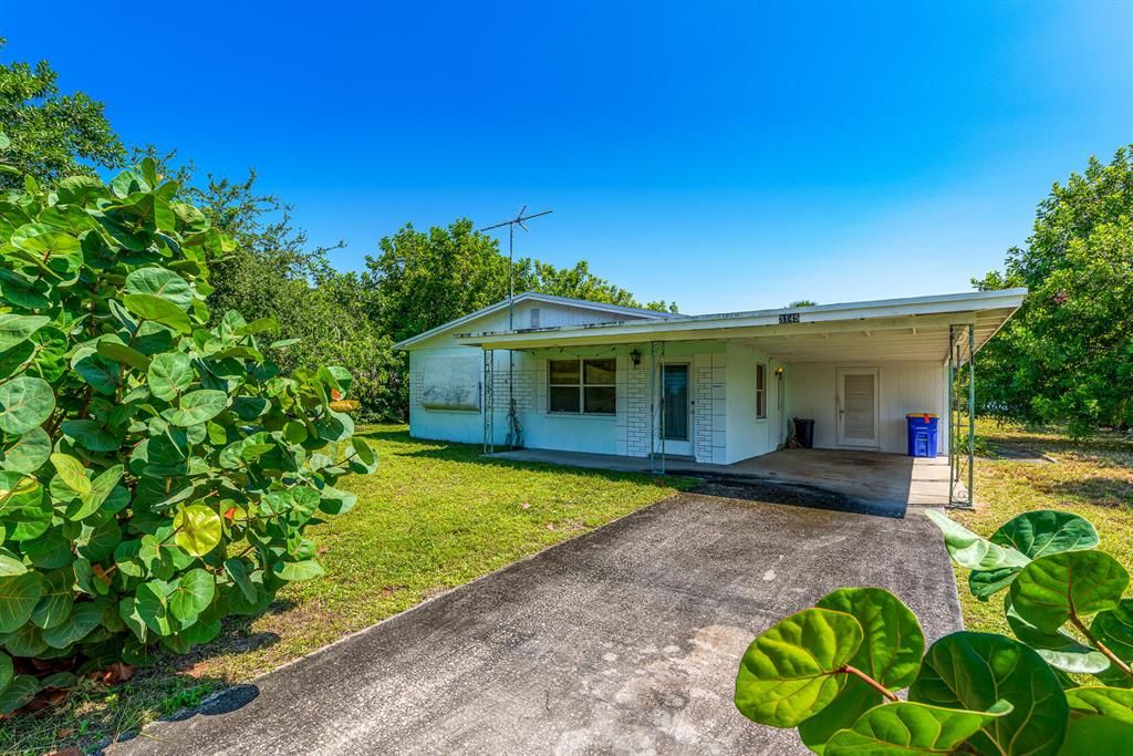 Photo of 3145 NE Highland Avenue, Jensen Beach, FL 34957 (MLS # R10746923)
