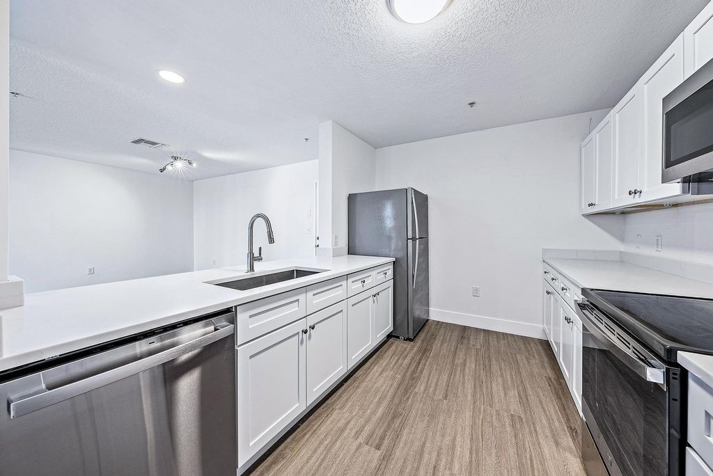 Photo of 1203 Town Center Drive #422, Jupiter, FL 33458 (MLS # R11110413)