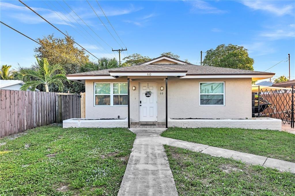 Beautiful completely remodeled 2 bed 2 bath single family house. Walking distance to stores ,shopping and restaurants. New roof, impact glass throughout, New central AC ,Laundry room with new washer and dryer ,alarm system ,newly painted inside and out with porcelain tile floors, granite countertops, all top new appliances, a lot of closet space and outdoor cover patio with back yard area. TENANT OCCUPIED UNTIL 09/15/2025 - Please do not disturb the tenants.