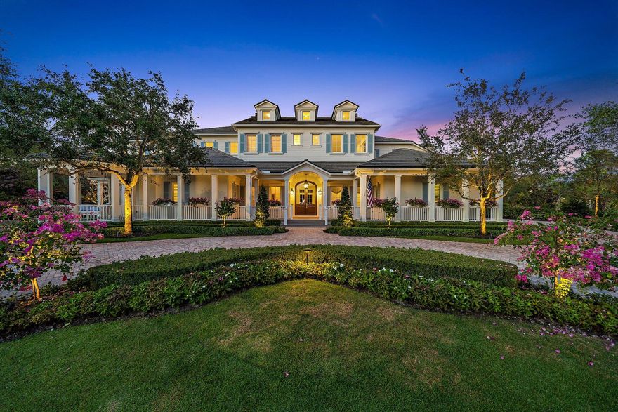 This exquisitely beautiful home tucked away within the intimate gated community of Old Marsh Golf Club is one of the best kept secrets in the area! Surrounded by scenic nature preserves, lakes and golf course views, this tailor fit home was recently renovated by the elite custom home builder, Turtle Beach Construction. 
This masterpiece was originally built in 2014 by Maxwell Construction, blending Edgartown and Augusta architecture featuring three stories, multiple outdoor porches, open kitchen, and family rooms, two primary suites, a wine room, two offices, Lutron lighting, brand new flooring throughout and the expansive backyard features the large swimming pool and views of championship golf course. The list of upgrades are endless at this breathtaking estate! Old Marsh offers 180 half-acre home sites with marsh, lake, or golf course views. All the residences here are custom estate homes and many are situated on two or three lots. The championship golf course was designed by the highly acclaimed architect Pete Dye and consistently has been ranked one of the best courses in the United States. Old Marsh Golf Club, with its newly renovated clubhouse, decorated in rich dark woods and comfortable fabrics that create a warm and friendly atmosphere, continues to preserve the true traditions of golf. Here, no starting times are required, and a nationally acclaimed caddy program enriches your experience on the course. Old Marsh Golf Club is recognized as one of the top 35 private clubs in the country and Audubon International awarded it certification for its environmentally enhancing design and maintenance. Birds, fish, and other wildlife abound at Old Marsh, yet it is still just minutes from all the shopping, dining, and entertainment venues of the Northern Palm Beaches. The Gardens Mall is but a short drive away, as is the Intracoastal, the Atlantic Ocean, Worth Avenue, City Place, the Kravis Center, many fine public and private schools, and the Palm Beach International Airport.