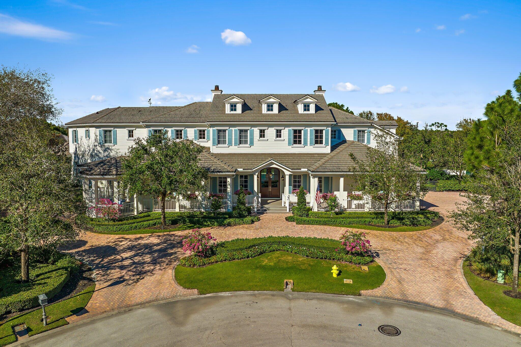 This exquisitely beautiful home tucked away within the intimate gated community of Old Marsh Golf Club is one of the best kept secrets in the area! Surrounded by scenic nature preserves, lakes and golf course views, this tailor fit home was recently renovated by the elite custom home builder, Turtle Beach Construction. This masterpiece was originally built in 2014 by Maxwell Construction, blending Edgartown and Augusta architecture featuring three stories, multiple outdoor porches, open kitchen, and family rooms, two primary suites, a wine room, two offices, Lutron lighting, brand new flooring throughout and the expansive backyard features the large swimming pool and views of championship golf course. The list of upgrades are endless at this breathtaking estate!