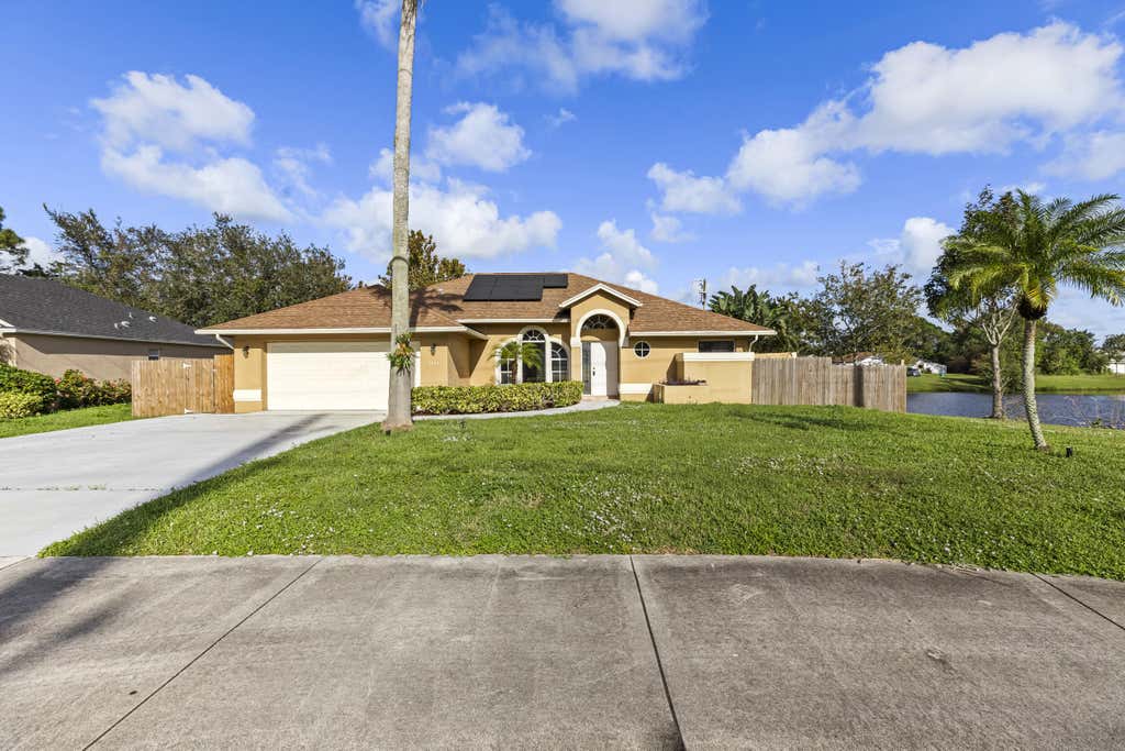 Photo of 2141 SW Bayshore Boulevard, Port Saint Lucie, FL 34984 (MLS # R11138968)