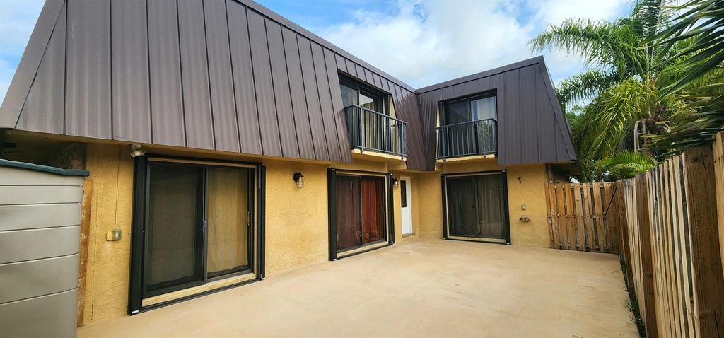 Photo of 5859 SE Windsong Lane, Stuart, FL 34997 (MLS # R10977682)