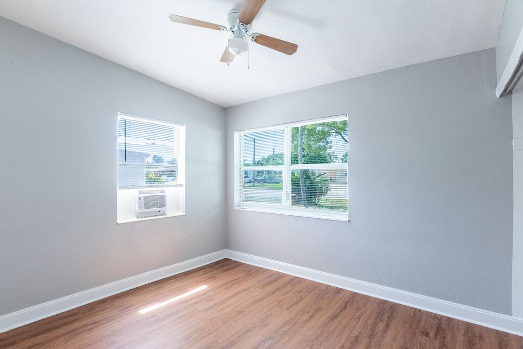 Photo of 191 Tulip Tree Drive, Lake Worth, FL 33462 (MLS # B26029253)