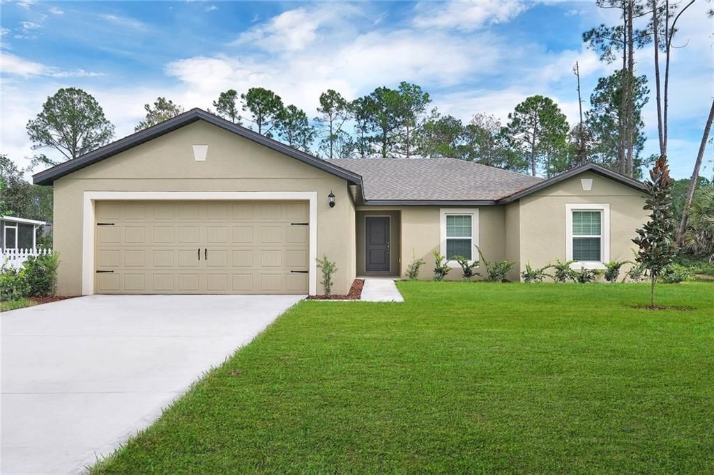 Photo of 1426 SW Wepaco Ave, Port St Lucie, FL 34953 (MLS # F10364446)