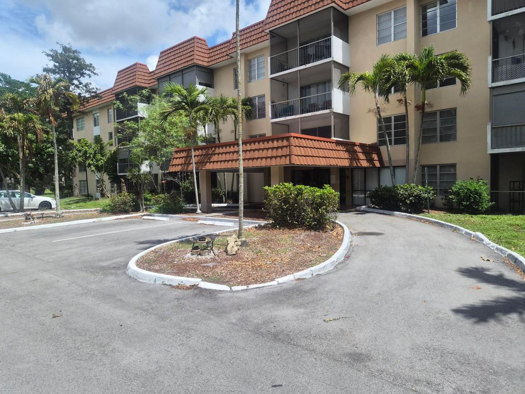 Photo of 4166 Inverrary Drive #403, Lauderhill, FL 33319 (MLS # B26012420)