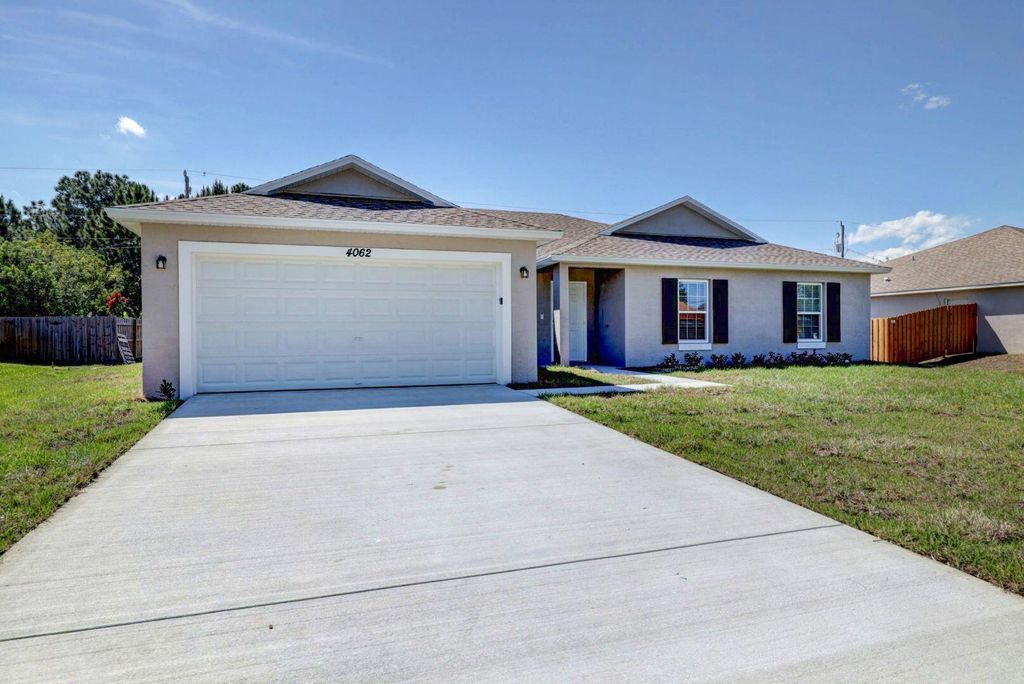 Photo of 2850 SW Rosetta Street, Port Saint Lucie, FL 34953 (MLS # R11166734)