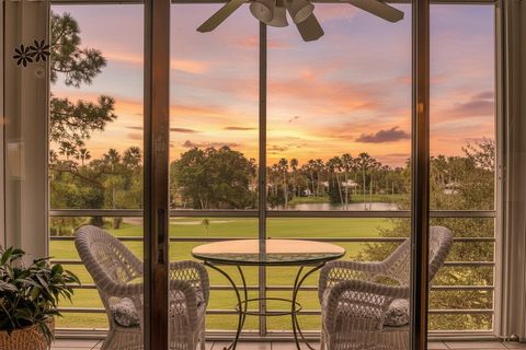 Photo of 3871 Via Poinciana #404, Lake Worth, FL 33467 (MLS # R11159520)