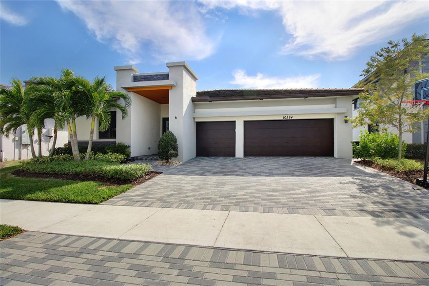 ABSOLUTELY STUNNING!! Remarkable single story CRIMSON Model in the highly sought after community of CASCATA in Parkland. This home boasts soaring high ceilings and a wide open triple split floor plan on a breathtaking waterfront lot! Private, fully turfed backyard oasis that features a stunning, dep blue pool with a sun shelf and spa. Primary bath boasting dual vanities, a huge frameless glass shower, and an oversized soaking tub. Large primary bedroom with oversized dual closets. Seller will include Golf Cart as a BONUS! Residents have access to Cascata AND Mira Lago amenities. Property is walking distance to both clubhouses that feature 2 resort style pools, 2 water parks, 2 fitness centers, Indoor basketball gymnasium, tennis courts, playgrounds, and more!