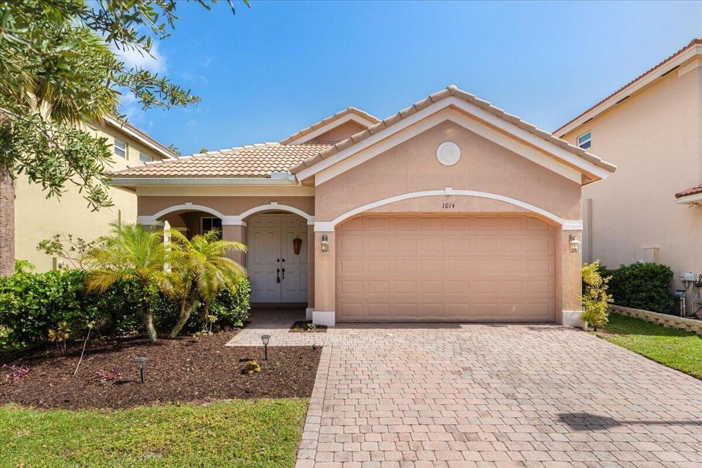 Photo of 1014 NW Leonardo Circle, Port Saint Lucie, FL 34986 (MLS # R11033535)